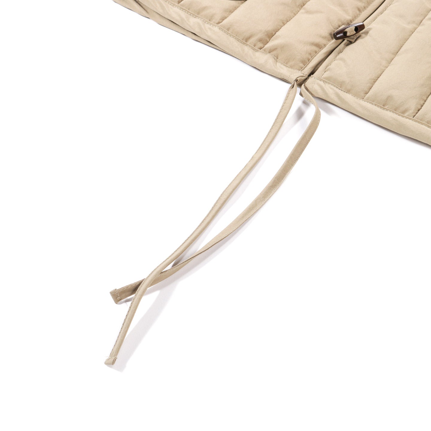 XENIA TELUNTS QUILTED GILET BEIGE
